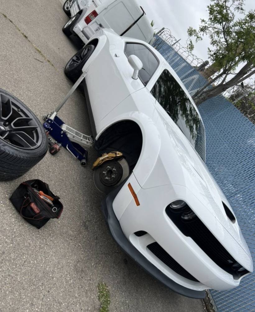 Front brake job on a Challenger, done on site