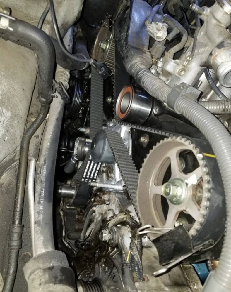 New timing belt, idler, and tensioner on a V6